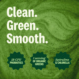 Suja Organic Greens Powder mixed in a glass of water