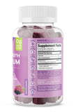 SUKU Magnesium Gummies displayed on a wooden table