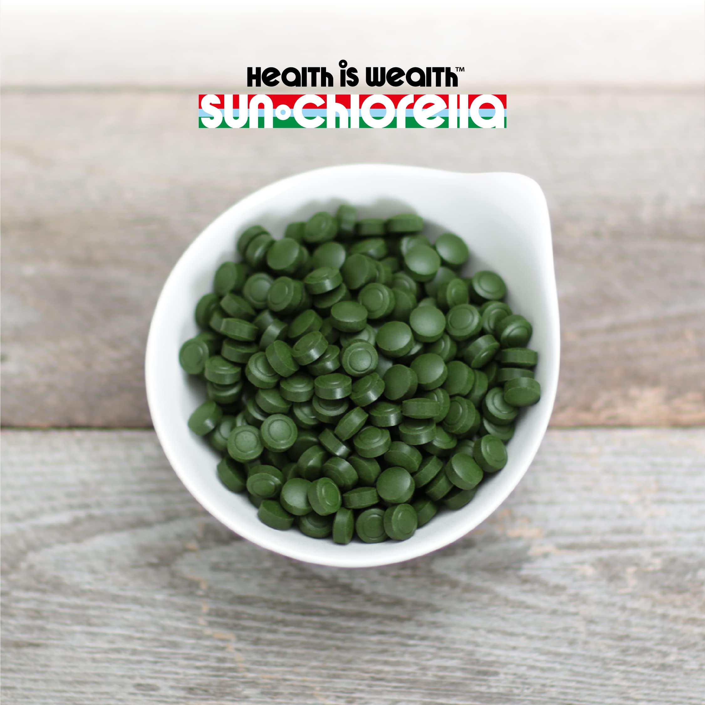 Sun Chlorella Chlorella Tablets on a wooden table