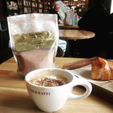 Sun Potion Anandamide Bliss Alchemy Cacao Blend with a spoon