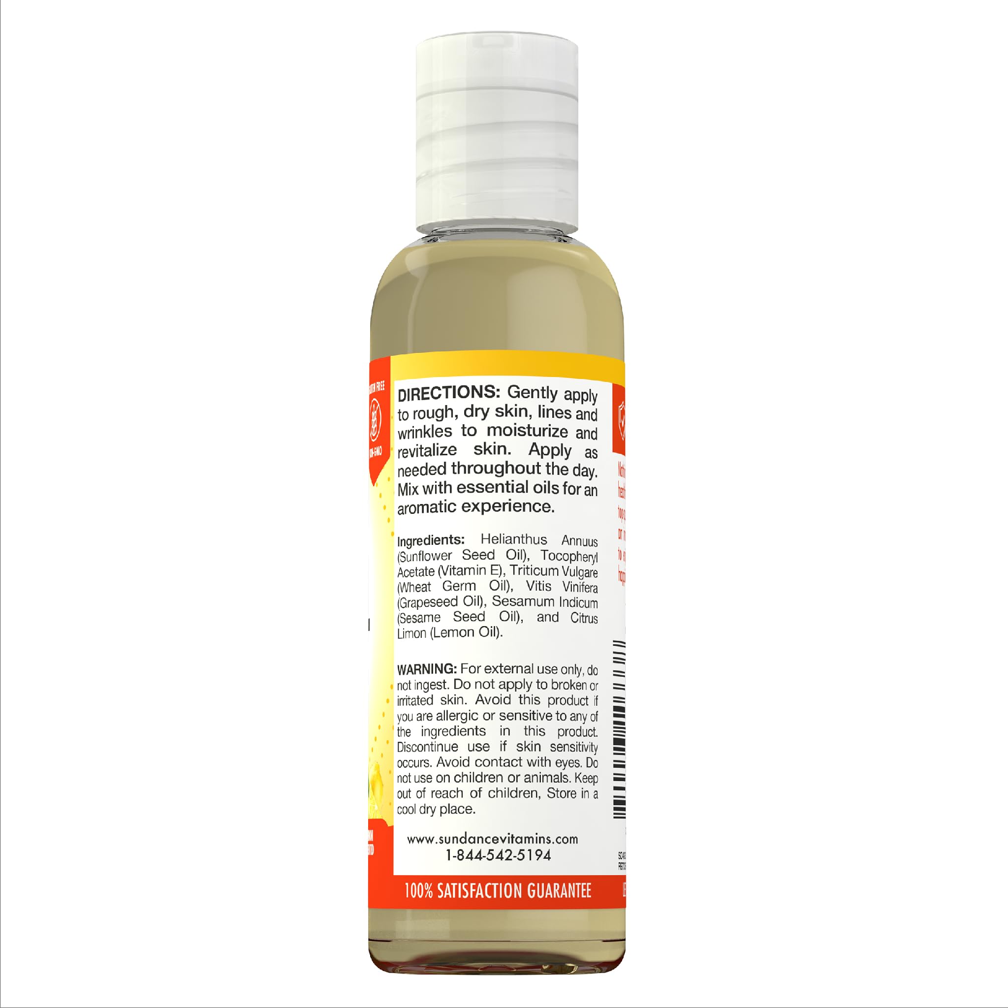 Sundance Vitamin E Skin Care Oil on a wooden surface