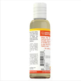 Sundance Vitamin E Skin Care Oil with a lemon slice