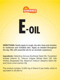 Sundance Vitamin E Skin Care Oil with lemon scent background