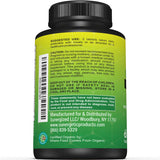 Sunergetic Organic Greens Tablets displayed on a wooden table