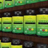 Sunergetic Organic Greens Tablets lifestyle shot with healthy foods