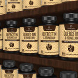 Sunergetic Quercetin & Bromelain Supplement bottle with measuring cup