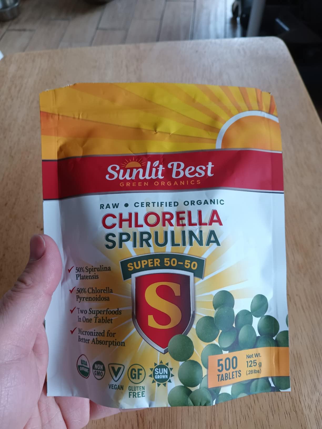 Sunlit Best Green Organics Chlorella Spirulina Tablets displayed with other supplements