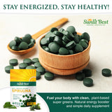 Sunlit Best Green Organics Spirulina Tablets on a wooden table