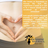 Sunshine Naturals Graviola Supplement capsule on a wooden surface