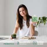 Sunwarrior Beauty Greens Collagen support in a glass with a spoon