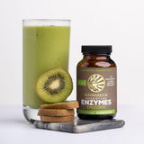 Sunwarrior Enzorb daily Enzyme Capsules on a wooden surface