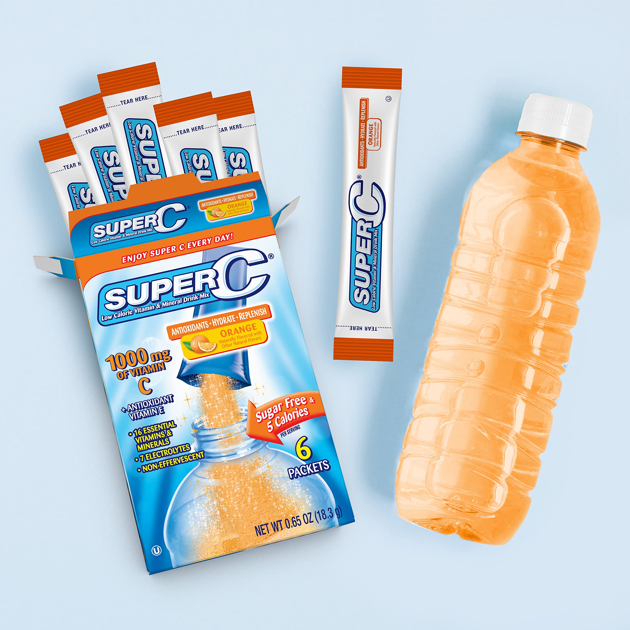 Super C drink mix being poured into a water bottle