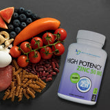 SUPPLEMENTS Zinc Picolinate 50mg capsules on a wooden table