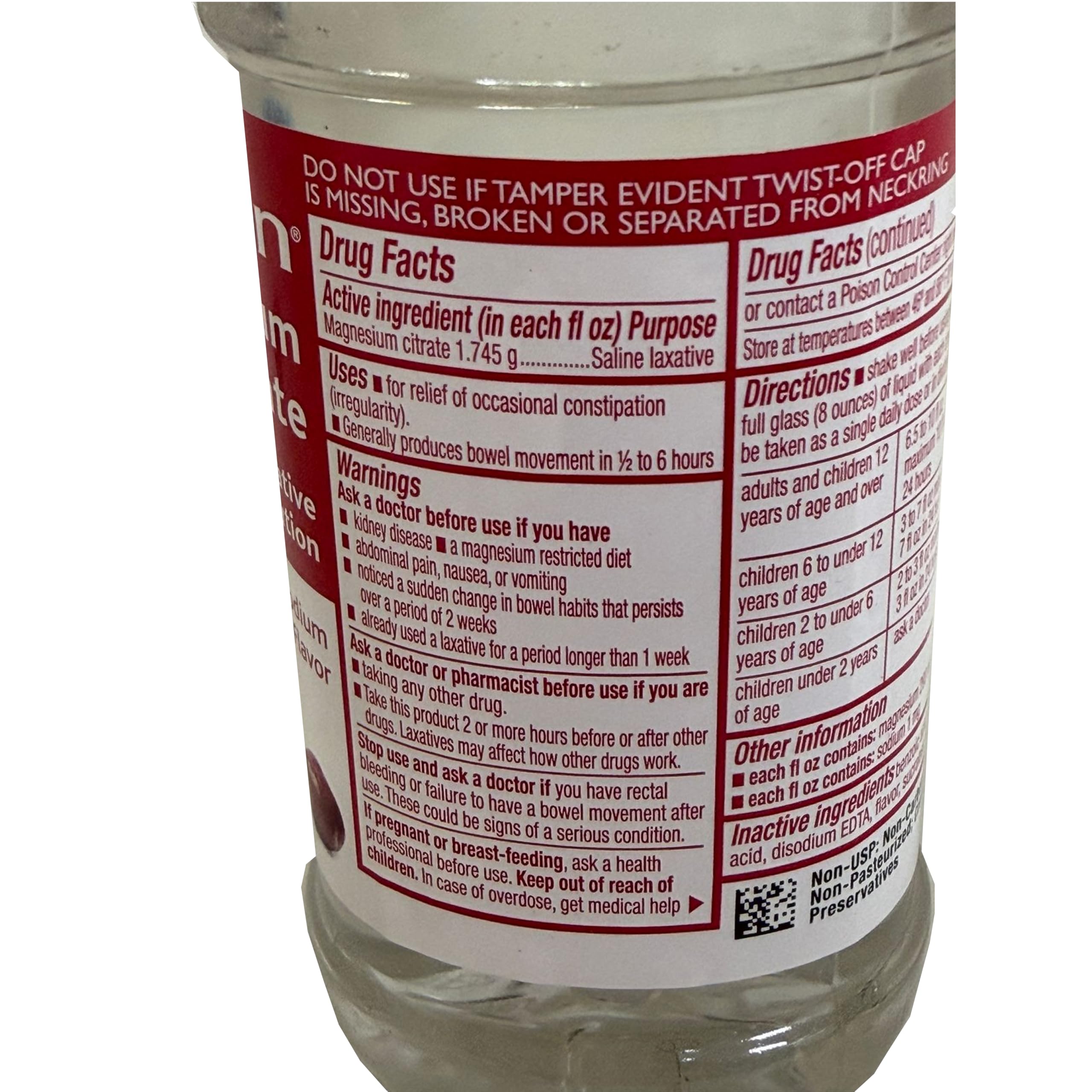 Swan Magnesium Citrate Oral Solution Cherry flavour with a glass