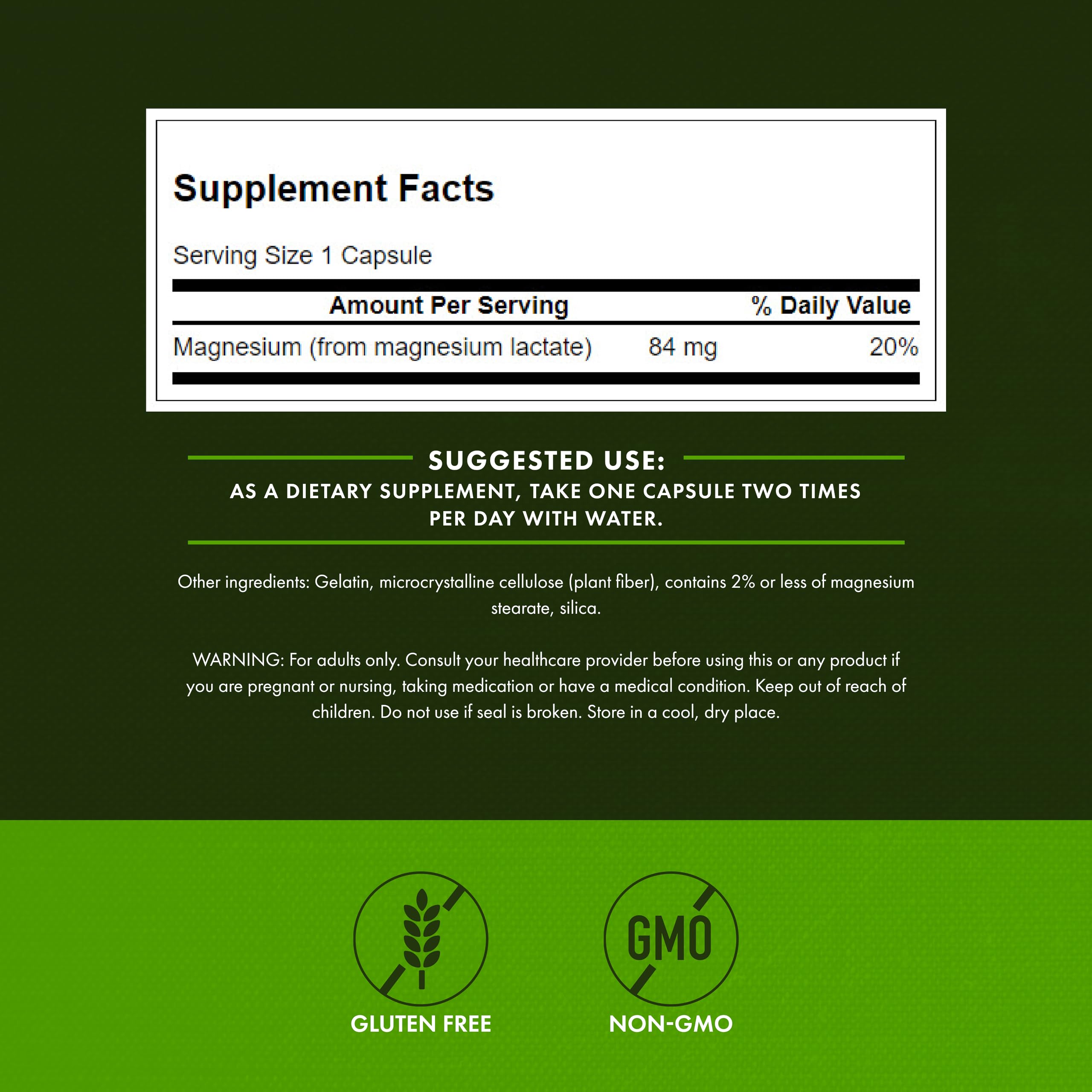 Swanson Magnesium Lactate 84mg capsules on a wooden table