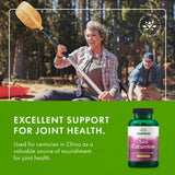 Swanson Sea Cucumber supplement bottle next to a glass of water