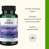 Swanson Selenium Supplement 100 mcg capsules on a wooden table