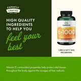 Swanson Vitamin E 671.1mg Softgel Capsules on a wooden table