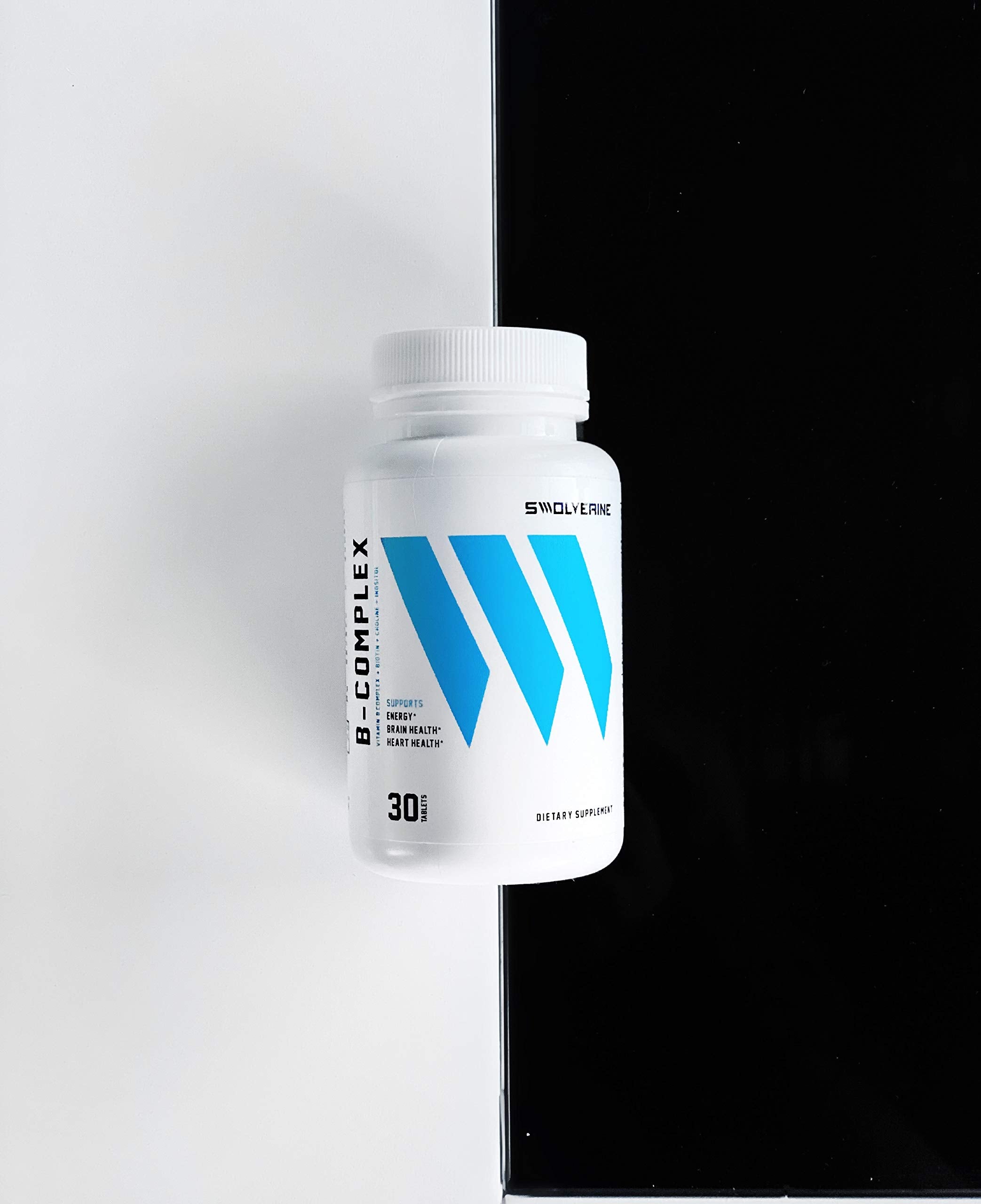 Swolverine B-Complex Vitamins 60 Capsules on a wooden table