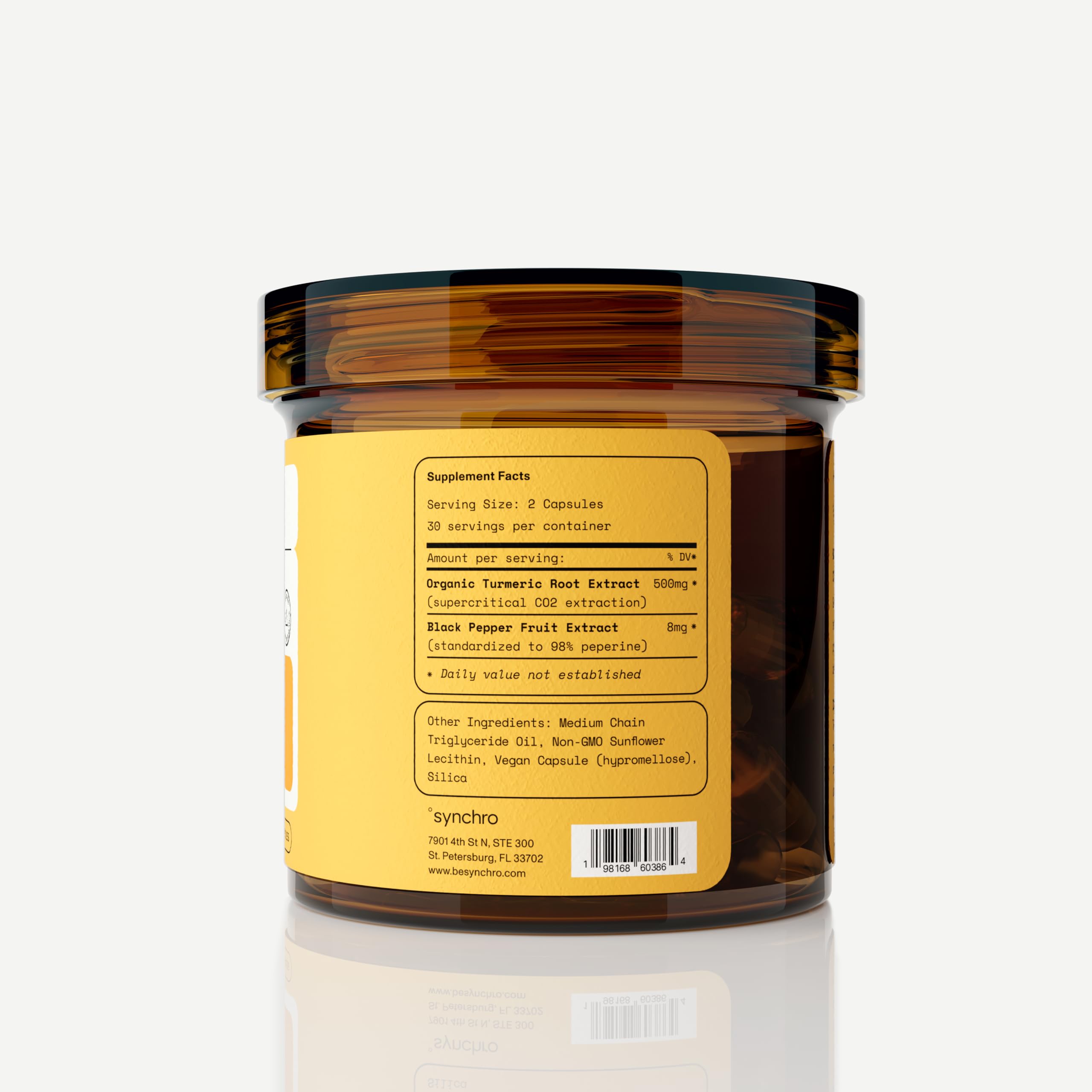 Synchro Turmeric Gold Ultra Concentrated Liposomal on a wooden table