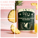Taeci Women's Wellness Gummies displayed on a wooden table