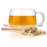 Tealyra Sleepy Nights Chamomile Herbal Blend in a cup with steam