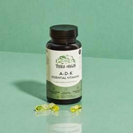 TERRA ORIGIN ADK Vitamin D3 & K2 Liquid Capsules in a hand