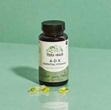 TERRA ORIGIN ADK Vitamin D3 & K2 Liquid Capsules in a hand