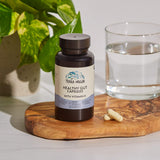 TERRA ORIGIN daily Support Capsules 500mg on a wooden table