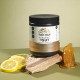 TERRA ORIGIN Healthy Gut Powder mixed in a glass of water