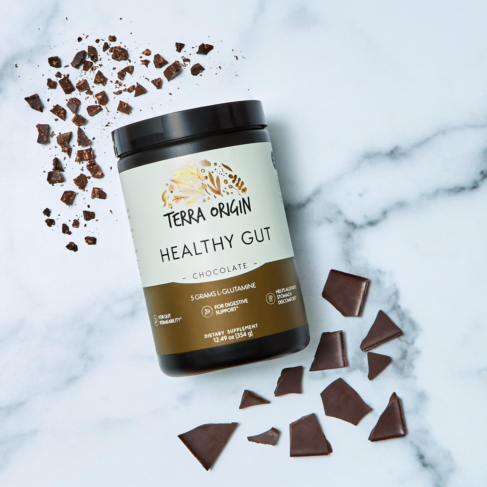 TERRA ORIGIN Healthy Gut Powder mixed in a glass of water