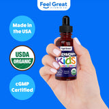 The Feel Great Vitamin Company Elderberry Syrup for Kids bottle with child