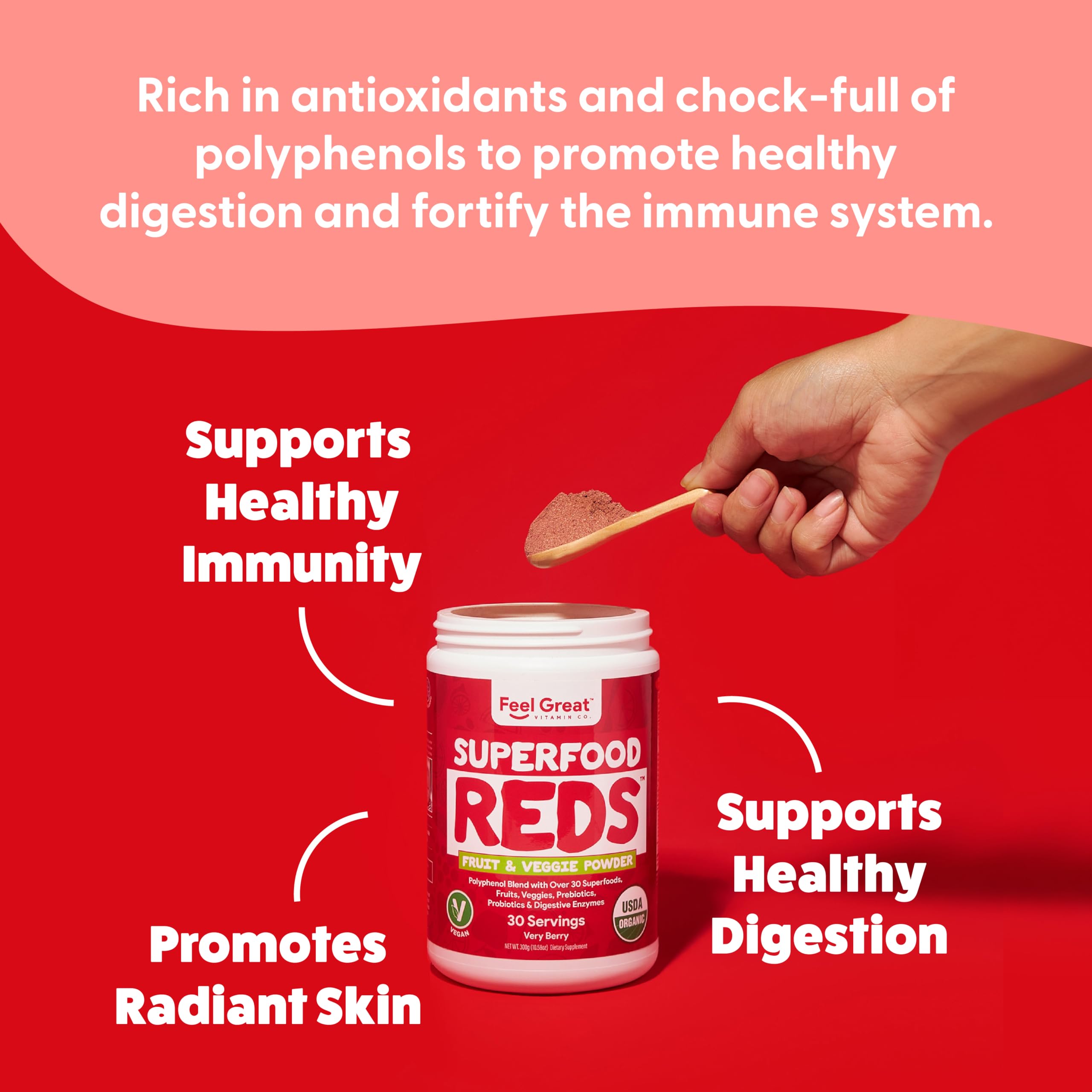 The Feel Great Vitamin Company Superfood Powder mixed in a glass of water