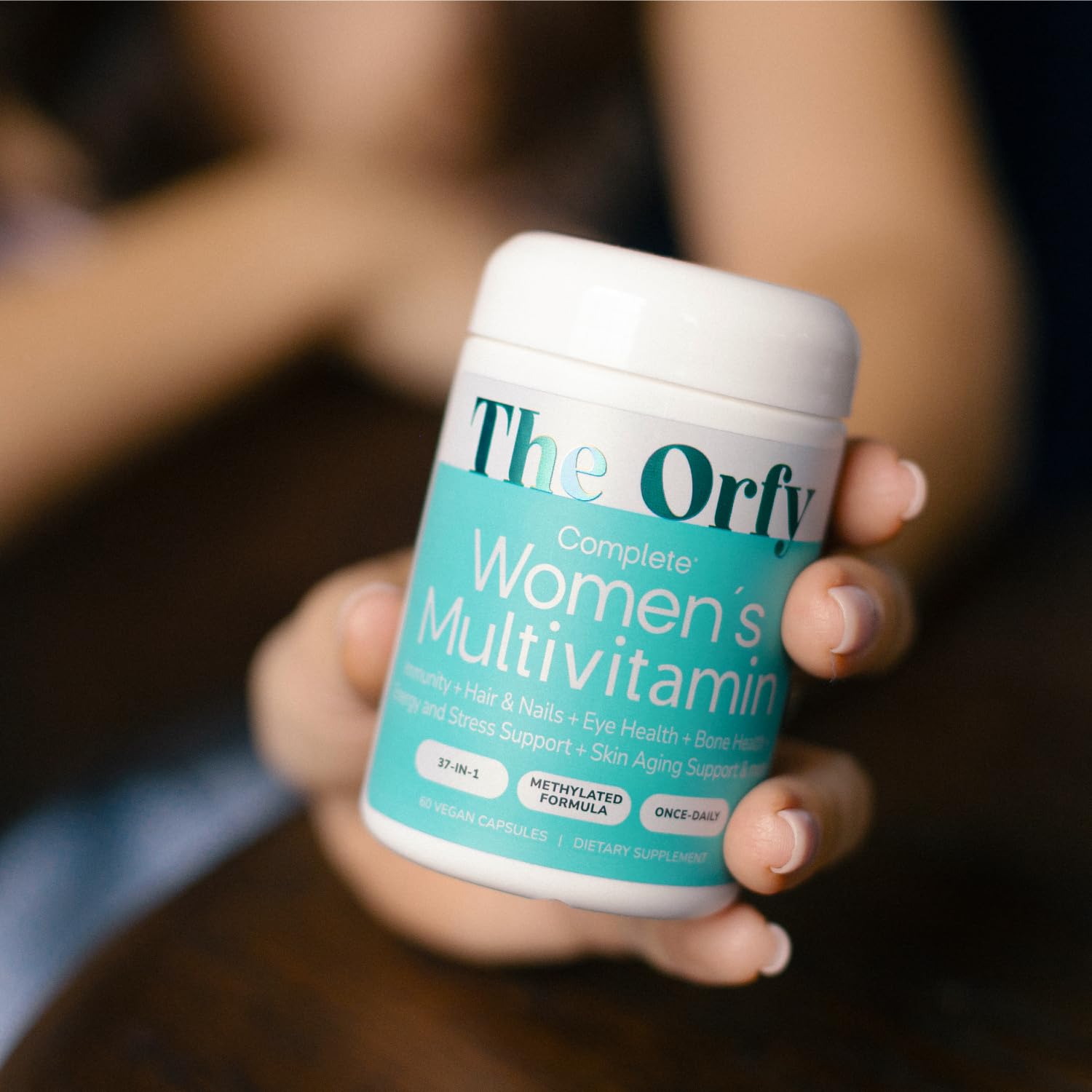 THE ORFY Advanced Women's Daily Multivitamins bottle with a leafy background
