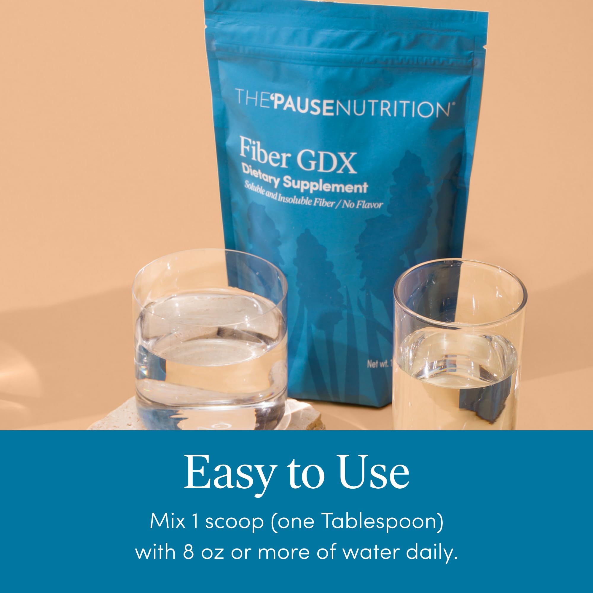 The 'Pause Life Fiber GDX unflavored powder on a kitchen counter
