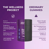 The Wellness Project Biotin Gummies lifestyle scene with a person holding the bottle