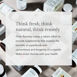 Think Remedy Aged Black Garlic Powder Capsules on a wooden table