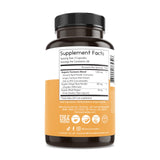 Thomas' all-natural Remedies Turmeric Ginger Supplement with a glass of water