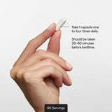 THORNE Magnesium Glycinate supplement in hand