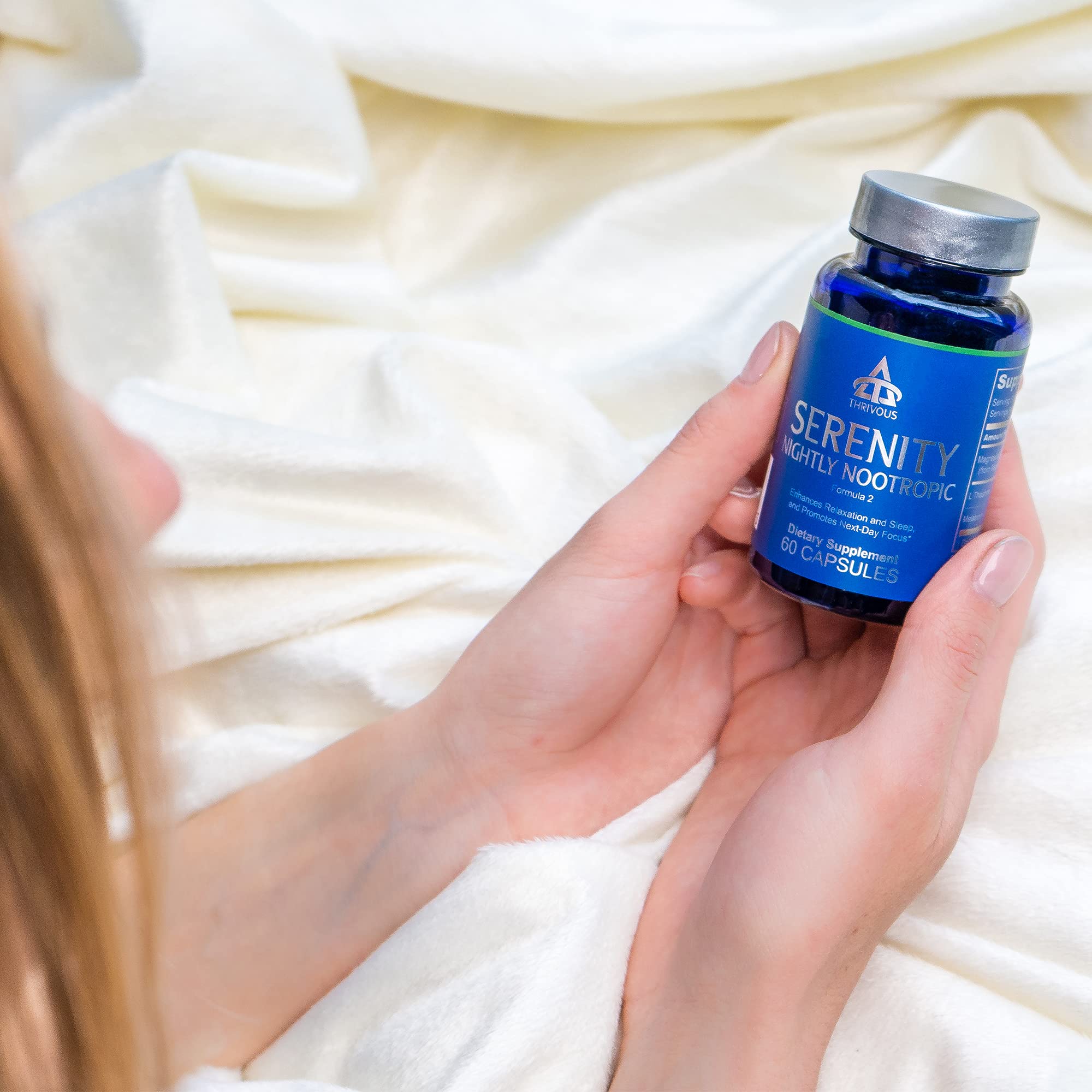 Thrivous Serenity Nightly Nootropic capsules in hand
