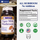 TIGERMM Organic Tiger Milk Mushroom capsules on a wooden table