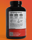 TNT Evolution Creatine Monohydrate Capsules on gym bench