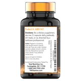 tnvitamins CoQ10 200mg black pepper capsules in a hand