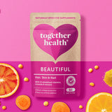 Together Hair Skin & Nail Capsules opened bottle with vegcaps