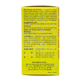 Tong Ren Tang Herbal Supplement opened bottle showing capsules
