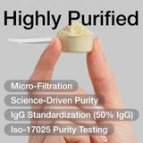 Toniiq Bovine Colostrum Powder mixed in a glass