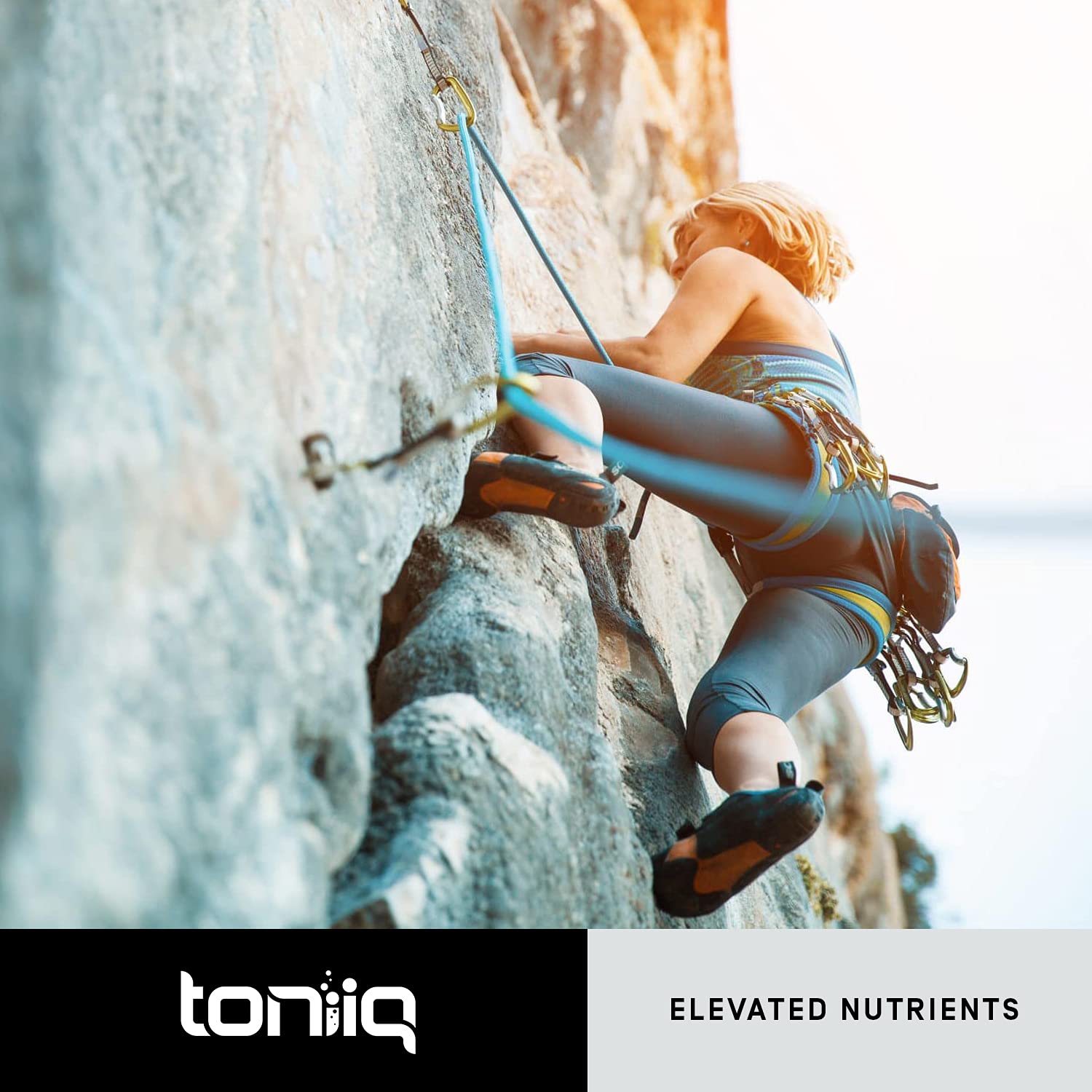 Toniiq Rhodiola Rosea supplement bottle with a glass of water