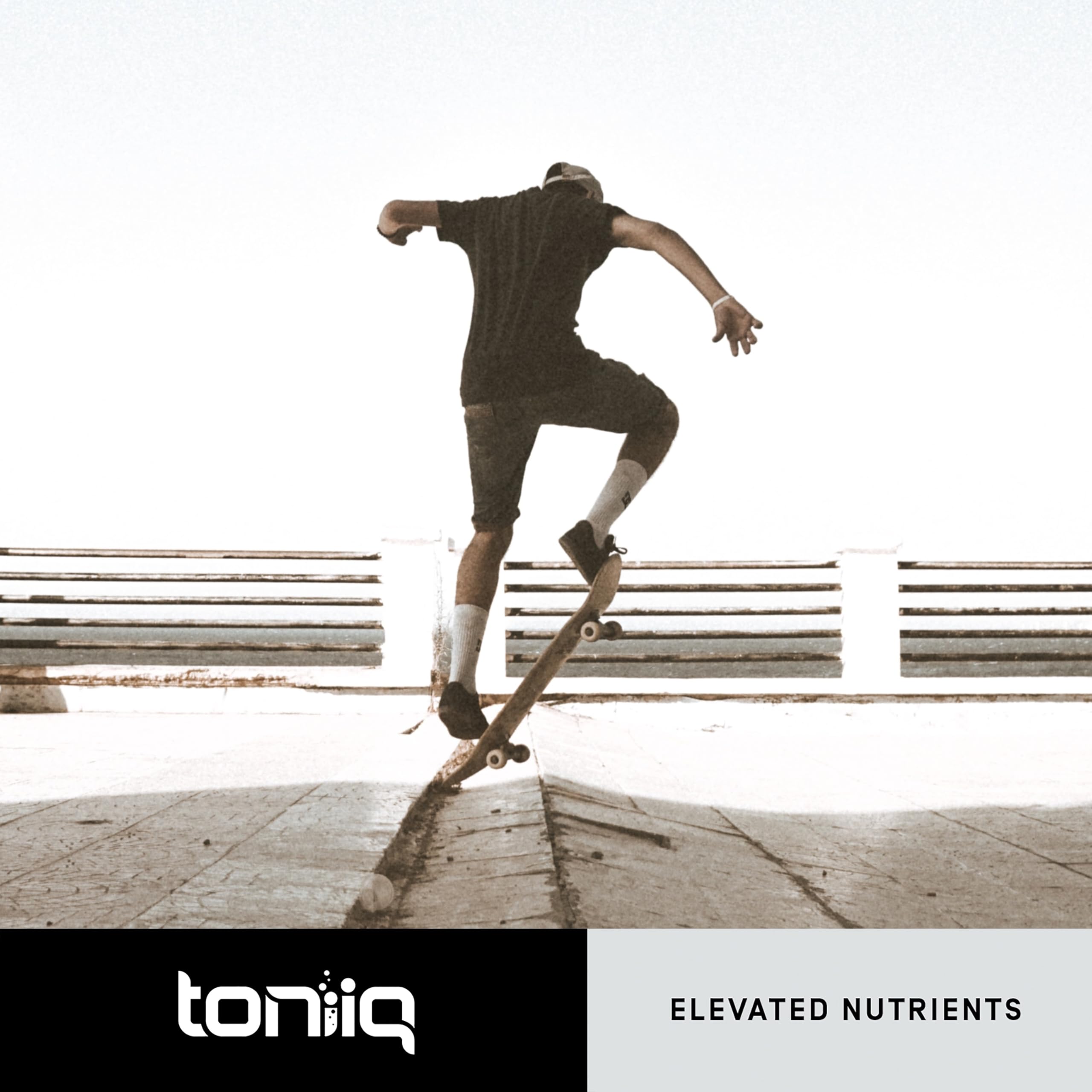 Toniiq Taurine 2000mg supplement on a wooden table background
