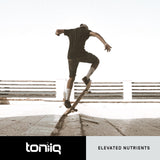 Toniiq Taurine 2000mg supplement on a wooden table background