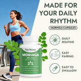 Top Nurex Moringa Leaf Capsules with measuring spoon